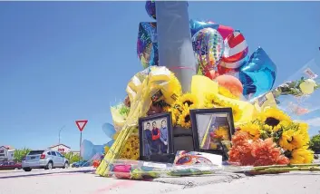  ?? ADOLPHE PIERRE-LOUIS/JOURNAL ?? A memorial for Manuel Tapia, the 15-year-old Cibola High School student who was killed in a hit-and-run near Cottonwood Mall on July 17.