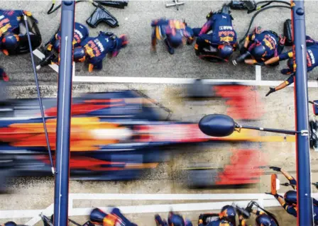  ?? GETTY IMAGES ?? Dierent strategy: A 4.2second pit stop for Red Bull’s Max Verstappen gave Mercedes a window to bring Lewis Hamilton in and send him out into the lead, but the reigning world champion stayed out a full six laps more.