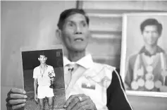  ??  ?? Myo Win Nyunt, 71, a former national football player, talking during an interview in Yangon, in this Jan 26 file photo. — AFP photo