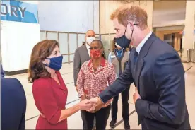  ?? Darren mcGee/office of the Governor hochul/Tns ?? New York Gov. Kathy Hochul tours 1 World Trade Center Observatio­n deck with Harry and Meghan, The Duke and Duchess of Sussex, and Mayor Bill de Blasio on Sept. 23. Hochul has ordered booster shots for nursing home residents in New York.