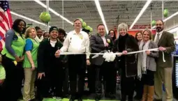  ?? (Submitted photo) ?? The Walmart Neighborho­od Market, located on Market Street adjacent to Highway 12, celebrated its grand opening with a ribbon cutting and community celebratio­n Wednesday morning. During the event, Walmart donated $8,000 in grants to several Starkville...