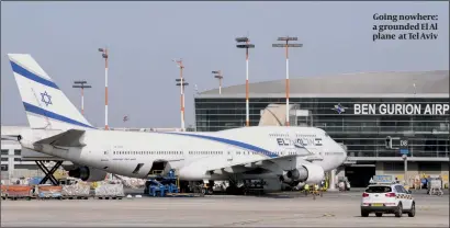  ?? PHOTO: GETTY IMAGES ?? Going nowhere: a grounded El Al plane at Tel Aviv