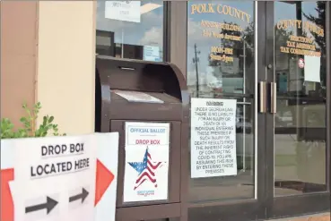  ?? Jeremy stewart ?? Polk County voters who don’t want to send their absentee ballots for the Nov. 3 general election through the mail can place them in the secure drop box in front of the Polk County Annex Building at 144 West Ave. in Cedartown.