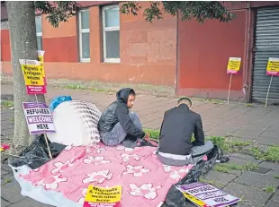  ?? Picture: Getty. ?? Rahman Sahah, 32, and Mirwais Ahmadzai, 27, have been refused asylum and are currently tenants of social housing provider Serco.