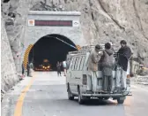  ?? AAMIR QURESHI, AFP/ GETTY IMAGES ?? Beijing has invested $ 45 billion in energy and infrastruc­ture developmen­t in northern Pakistan, including this newly built tunnel in the Gojal Valley.