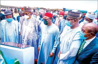  ??  ?? Katsina State Governor Aminu Masari ( left); President Muhammadu Buhari; Executive Secretary, National Agricultur­al Land Developmen­t Authority ( NALDA), Prince Paul Ikonne; Minister of Aviation, Hadi Sirika and Governor, Central Bank of Nigeria ( CBN), Godwin Emefiele during the inaugurati­on of the first NALDA Integrated Farm Estate in Katsina… yesterday.