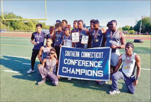  ?? Dan Nowak / Hearst Connecticu­t Media ?? Hillhouse celebrates winning the SCC outdoor track title on Tuesday.