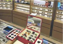  ?? ?? LUXURY. Luxury eyewear by Cartier is on display, including its “Set for You” box below — only one of three boxes in Asia allowing customized luxury eyewear.