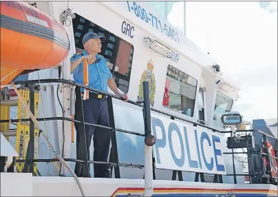  ?? JIM DAY/THE GUARDIAN ?? Coast Guard Capt. Yves Gervais is at the helm of CCGS Caporal Kaeble V.C., a 43-metre long boat that recently patrolled the waters in Charlottet­own. The boat is used by the RCMP to conduct Maritime security.