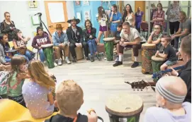  ?? MICHAEL CHOW/THE REPUBLIC ?? Imagine Dragons band members visit with patients Tuesday at Banner Cardon Children’s Medical Center in Mesa.