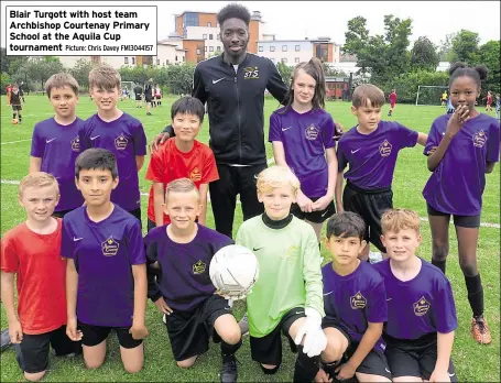  ?? Picture: Chris Davey FM13044157 ?? Blair Turgott with host team Archbishop Courtenay Primary School at the Aquila Cup tournament