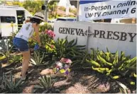  ?? JAE C. HONG AP ?? Joanna Garcia leaves flowers outside Geneva Presbyteri­an Church on Monday to honor victims in Sunday’s shooting at the church in Laguna Woods in Orange County.