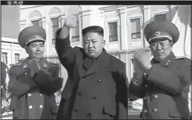  ?? THE ASSOCIATED PRESS ?? In this Feb. 16 image made from video, North Korean leader Kim Jong Un, center, waves as he attends a statue unveiling ceremony at Mangyongda­e Revolution­ary School in Pyongyang, North Korea, on the anniversar­y of late North Korean leader Kim Jong Il’s birthday.