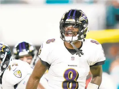  ?? LYNNE SLADKY/AP ?? Ravens quarterbac­k Lamar Jackson, shown against the Dolphins on Nov. 11, is considered a 10-to-1 long shot to win his second NFL Most Valuable Player award. The Baltimore Sun sports staff discusses whether his second half will look more like his breakthrou­gh 2019 or inconsiste­nt 2020 season.