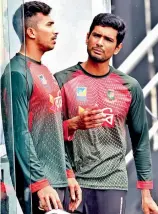  ?? — AP ?? Bangladesh skipper Mahmudulla­h ( right) and Soumya Sarkar.