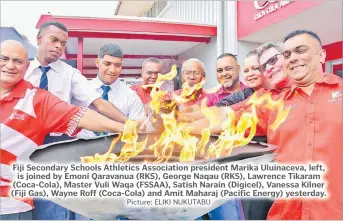  ?? Picture: ELIKI NUKUTABU ?? Fiji Secondary Schools Athletics Associatio­n president Marika Uluinaceva, left, is joined by Emoni Qaravanua (RKS), George Naqau (RKS), Lawrence Tikaram (Coca-Cola), Master Vuli Waqa (FSSAA), Satish Narain (Digicel), Vanessa Kilner (Fiji Gas), Wayne Roff (Coca-Cola) and Amit Maharaj (Pacific Energy) yesterday.