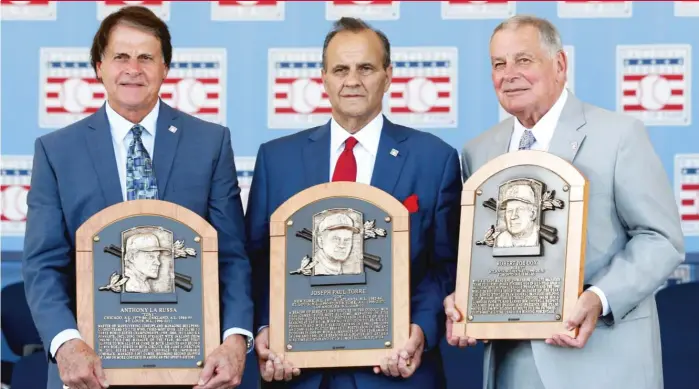  ?? ?? Tony La Russa was inducted into the Hall of Fame in 2014 with fellow managers Joe Torre (center) and Bobby Cox. Things aren’t as simple now for La Russa, whose White Sox are struggling more than expected.