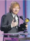  ?? ARCHIVO/REUTERS ?? Ed Sheeran con un Grammy.