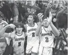  ?? MICHAEL KARAS/NORTHJERSE­Y.COM ?? Don Bosco’s Dylan Harper (2) celebrates with Malik Sheppard (5) and Brad Brown after defeating Paul IV.