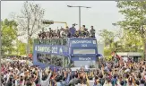  ?? PTI ?? GT celebrated the win with an open bus ride in Ahmedabad.