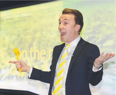  ?? Picture: RICHARD GOSLING ?? Auctioneer Mitch Peereboom at the Ray White auction spectacula­r at Sheraton Grand Mirage Resort.