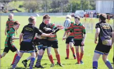  ?? ?? Campbeltow­n/Kintyre players in action against an Oban Lorne team.
Members of Campbeltow­n/Kintyre Junior Rugby Club.