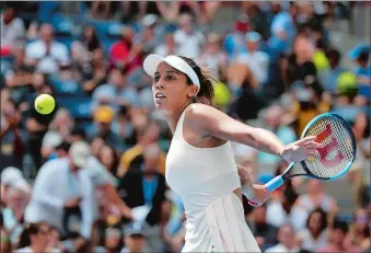  ?? JASON DECROW/AP PHOTO ?? Madison Keys returns a shot to Aleksandra Krunic during the third round of the U.S. Open on Saturday in New York. Keys dropped the first set, but came back to beat Krunic 4-6, 6-1, 6-2, advancing to the Sweet 16.