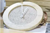  ??  ?? Wooden clocks by Anna Zavalla of Rawtura