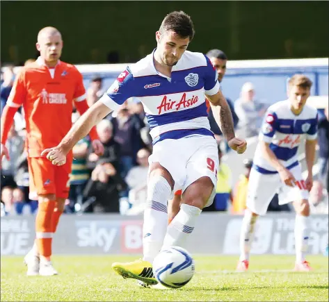  ?? PICTURES: Action Images ?? CHARLIE’S ANGEL: Charlie Austin finds the net with QPR’s penalty, which enraged Lions boss Ian Holloway