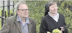  ??  ?? The funeral of Seamus Kelters took place on Saturday at St Michael’s Church in south Belfast (main picture). Among those attending were (from left) UTV presenter Paul Clark; former Belfast Lord Mayor Tom Hartley with ex-BBC journalist Martina Purdy,...