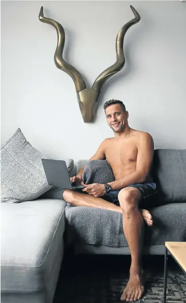  ?? Pictures: Ruvan Boshoff ?? Chad Le Clos relaxes at home in Sea Point, Cape Town, this week.