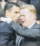  ??  ?? WISE WORDS: Ronald Koeman consoles Gus Poyet at Southampto­n.