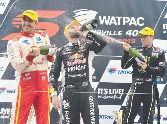  ??  ?? IN DOUBT: 2019 Townsville 400 Race 2 winner Shane van Gisbergen (centre) with runner-up Fabian Coulthard and third placegette­r Cameron Waters.