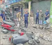  ??  ?? Manipur CM N Biren Singh visits the spot of a powerful IED blast at Thangal Bazaar in Imphal on Tuesday. PTI