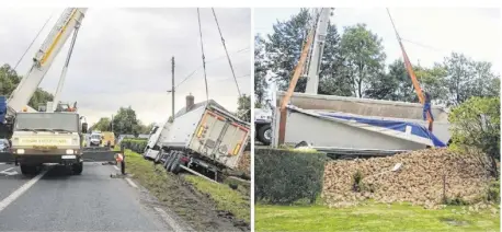  ??  ?? Les dépanneurs sont intervenus pour relever le camion dont la cargaison de betteraves a atterri dans un jardin.