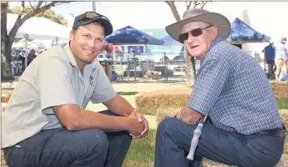  ??  ?? CATCH UP: Victorian Farmers Federation president David Jochinke, left, and Merv Thomas catch up at a past Wimmera Machinery Field Days. Picture: PAUL CARRACHER