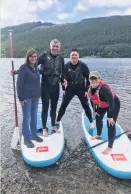  ??  ?? On the water John Saunderson (centre left) with his family on Loch Tay