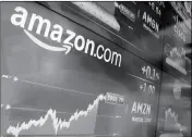  ?? ASSOCIATED PRESS ?? IN THIS MAY 30 FILE PHOTO, the Amazon logo is displayed at the Nasdaq MarketSite, in New York’s Times Square. Amazon announced Sept. 7, that it has opened the search for a second headquarte­rs, promising to spend more than $5 billion.