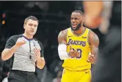  ??  ?? LeBron James has been to the playoffs in 13 consecutiv­e seasons but is in position to miss the postseason in his first season with the Lakers. [AP PHOTO/JOHN BAZEMORE]