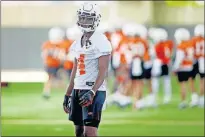  ?? TERRY/ THE OKLAHOMAN] ?? A.J. Green recorded 49 tackles with an intercepti­on last season under OSU's first-year defensive coordinato­r Jim Knowles. [BRYAN