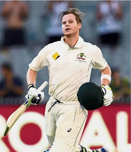  ?? — AFP ?? Jubilation: Australia batsman Steve Smith celebrates scoring his century against Pakistan on the fourth day of the second Test in Melbourne yesterday.