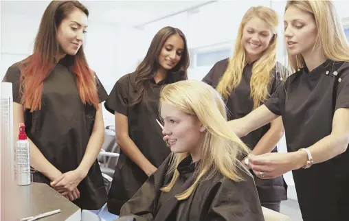  ?? THINKSTOCK PHOTO, ABOVE; COURTESY PHOTO, BELOW ?? LOOKING GOOD: Co-owners Christina Truscello and Lypor Leong show off their Teal Hair & Makeup Studio, right. Truscello attended cosmetolog­y school to change careers.