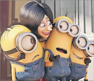  ?? AP PHOTO ?? In this image released by Universal Pictures, Scarlet Overkill, voiced by Sandra Bullock, second left, appears with minions Stuart, left, Kevin and Bob, right, in a scene from the animated feature, “Minions.