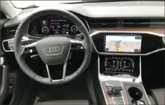  ??  ?? The interior of the 2021 Audi A6 Allroad Quattro is as functional as it is attractive, with a touchscree­n that provides real feedback when operated.