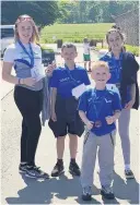  ??  ?? Family fun run James, front, with, from left, big cousin Cara and step-siblings Jamie and Cara