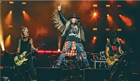  ??  ?? (From left) Duff McKagan, Axl Rose and Slash at a recent concert in Iceland.