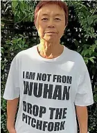  ??  ?? Helene Wong got fed up with racist comments so she got a T-shirt made.