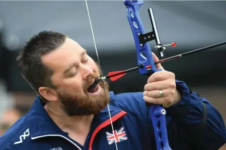  ?? RENÉ JOHNSTON/TORONTO STAR ?? Great Britain’s Callum Nugent pulls the string of his bow back with a mouth tab as he competes in archery at Fort York.