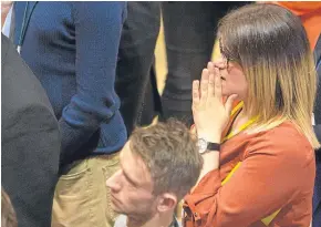  ?? Pictures: Steven Brown. ?? Top: congratula­tions for the Conservati­ves’ David Ross and Labour’s Judy Hamilton, elected for Dunfermlin­e South and Kirkcaldy Central, respective­ly; middle: announcing the Kirkcaldy North result; above: an anxious-looking Julie Ford, who was elected...