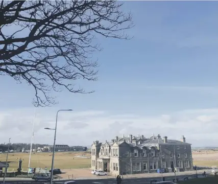  ??  ?? 0 Normally a hive of activity, the area around the R&A Clubhouse in St Andrews lies eerily quiet on Sunday.